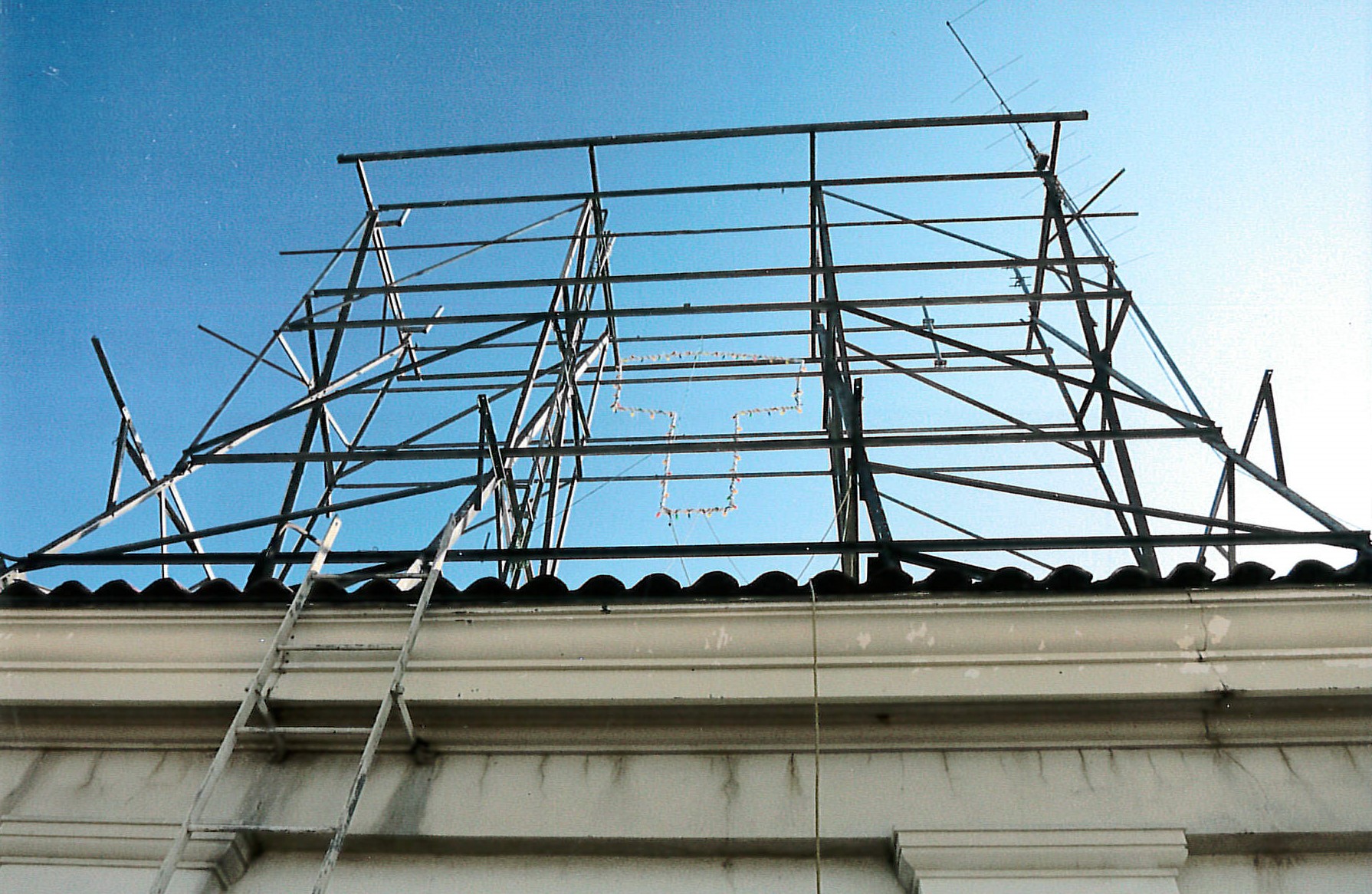 Original metal sign frame on upper roof 